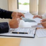 How a Loan Settlement Company Negotiates With Multiple Lenders