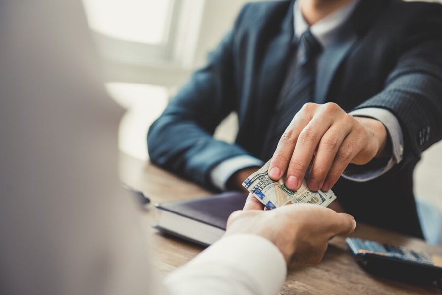 Debt Settlement for Borrowers with Multiple Loans